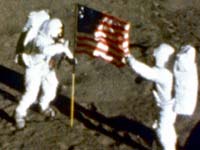 Apollo 11 deploys the U.S. flag on the Moon, July 20 1969